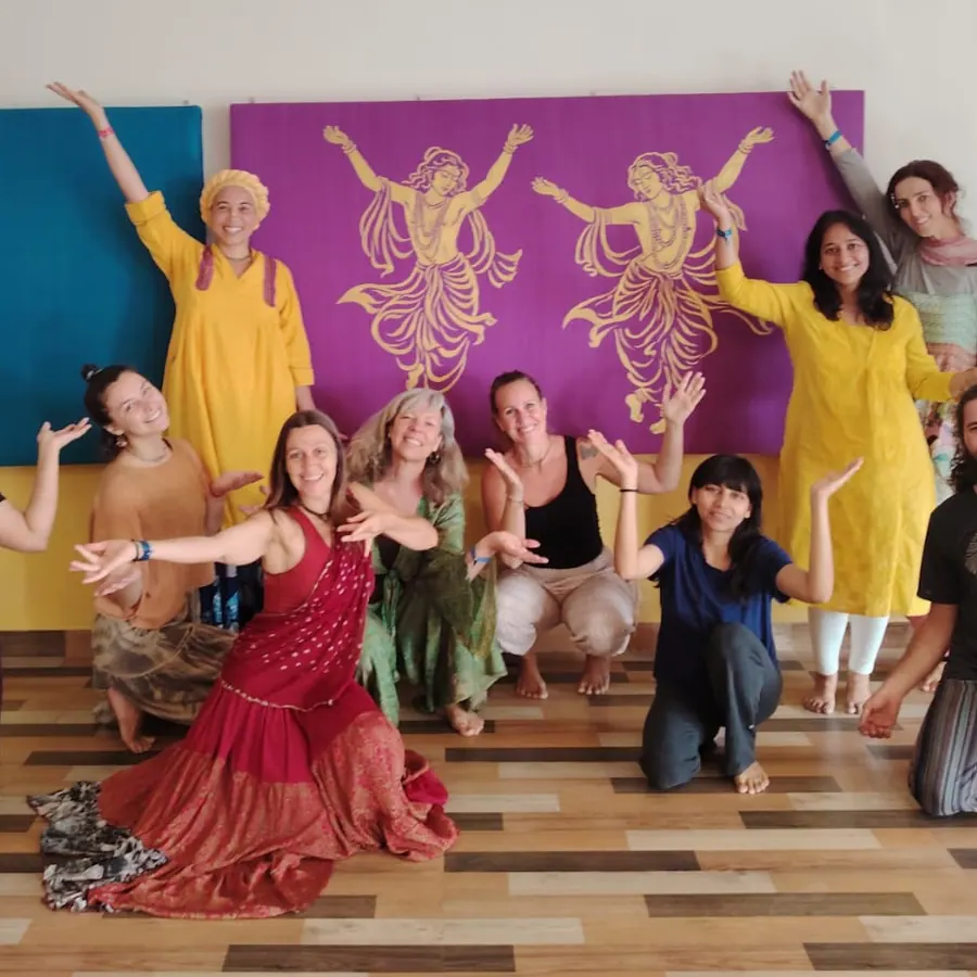 Devotional dance in front of the hall mural