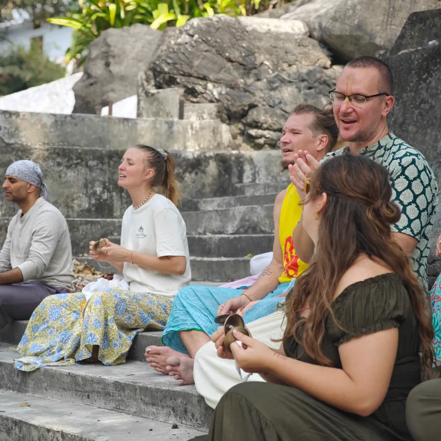Sharing stories on the ghat steps by the Ganga