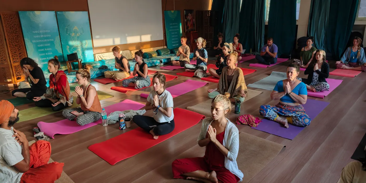 Morning sadhana together in the ashram hall
