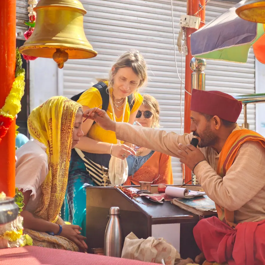 Receiving a blessing during a sacred visit in Rishikesh